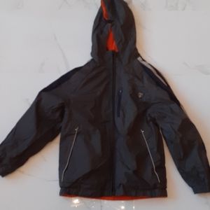 Reversible windbreaker for boys.